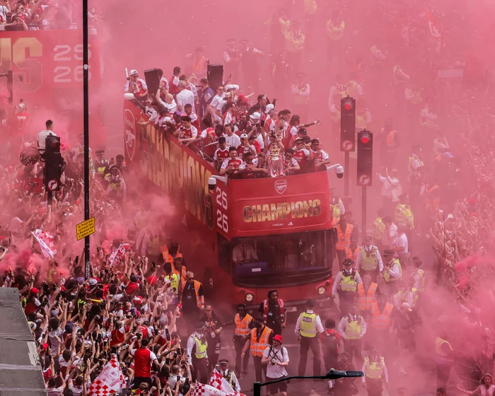 Arsenal Celebrates Premier League Triumph Amidst Champions League Pain