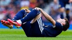 Scotland's Clarke Expresses Concern Over Gilmour's Injury
